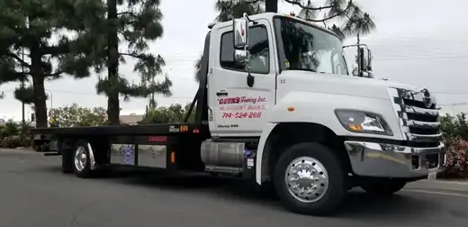 A Geer's Towing Hino flatbed tow truck ready for dispatch in Anaheim